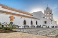 Huelva, Spain - September 8, 2020: View of Sanctuary Virgen de la Cinta from Gardens, backlighted with sun flares, patron virgin