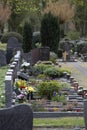 Huerth, NRW, Germany, 04 17 2021, row of graves on a grave yard