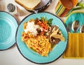 Huevos a la Mexicana, Mexican scrumbled eggs as a breakfast plate in a traditional restaurant in mexico