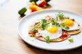 huevos rancheros on white plate, natural light, minimalist styling
