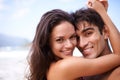 Hug, beach and portrait of couple on vacation, adventure or holiday for romantic travel. Happy, love and young man and Royalty Free Stock Photo