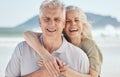 Hug, beach and portrait of senior couple on a romantic vacation, adventure or weekend trip. Happy, smile and elderly Royalty Free Stock Photo