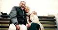 Hug, bench and senior couple on bench at park with love to relax with quality time or care. Retirement, support and Royalty Free Stock Photo