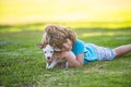 Hug dog friends. Child with puppies doggy kissing and hugging. Royalty Free Stock Photo