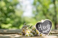 Hug me hand drawing phrase on a heart, Sharing a Hug concept Royalty Free Stock Photo