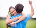 Hug, outdoor and couple with fitness, celebration and exercise goals with progress and achievement. Park, embrace and Royalty Free Stock Photo