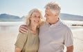 Hug, senior couple and outdoor at the beach with happiness, freedom and love on vacation. Portrait of a man and woman on Royalty Free Stock Photo