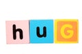 Hug in toy play block letters on white Royalty Free Stock Photo