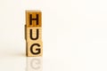 HUG - words from wooden blocks, Front view Royalty Free Stock Photo