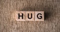 HUG - words from wooden blocks, Top view Royalty Free Stock Photo