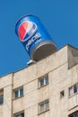 Huge advertising can of famous Pepsi drink in Bucharest on top o