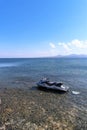 Armenia, Lake Sevan, September 2021. Jet ski on a leash near the shore.