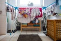 Huge amount of laundry drying in the bathroom