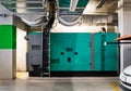 Huge backup electrical power generator in office building. Royalty Free Stock Photo