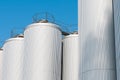 Huge barley tanks close up shot