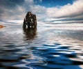 Huge basalt stack Hvitserkur reflected in the calm waters of Atlantic Ocean.