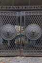 Huge Black metal gate at the main entrance with Lion head embossed on it on Gillander House Royalty Free Stock Photo