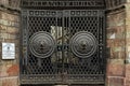Huge Black metal gate at the main entrance with Lion head embossed on it on Gillander House Royalty Free Stock Photo