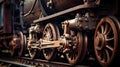 Huge black metal gear train wheel structure on the old steam engine train locomotive close up Royalty Free Stock Photo