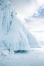 A huge block of ice hanging over the surface of Lake Baikal. Royalty Free Stock Photo