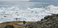 Huge blocks of ice on Glacial river and blue icebergs on Jokulsarlon glacier lake. Vatnajokull National Park, Iceland