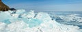 Huge blocks of transparent blue ice covered with snow, hummocks Royalty Free Stock Photo