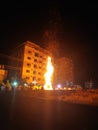 Huge bonfire burning wood and grass fire ignite to celebrate holi festival.