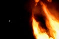 Bonfire roars with huge flames on Guy Fawkes Night Royalty Free Stock Photo