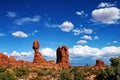 Large boulder balanced in desert on thin column of rock in Utah Royalty Free Stock Photo