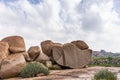 Huge boulders one cut in half above Virupaksha temple, Hampi, Karnataka, India