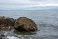 Huge boulders on the shores of a small bay of the Sea Royalty Free Stock Photo