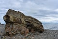 Huge boulders on the shores of a small bay of the Sea Royalty Free Stock Photo