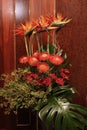 Huge bouquet with Strelitzia flowers in a vase standing on the floor Royalty Free Stock Photo