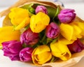 A huge bouquet of yellow purple tulips close-up. Fresh natural spring flowers, blossom tulip Royalty Free Stock Photo