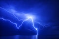 A huge branched lightning strikes the sea Royalty Free Stock Photo