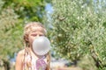 Huge bubble from chewing gum Royalty Free Stock Photo