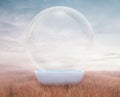 Huge bubble emerging from white bathtub in tall yellow grass field