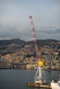 Huge cargo crane with Panoramic view port of Genoa in a summer day, Italy