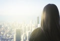 Huge city chicago skyline sunset with woman looking out Royalty Free Stock Photo