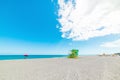 Huge cloud over a colorful lifeguard tower in Miami Beach Royalty Free Stock Photo