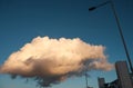 Huge Cloud Over Train Station In East London. Street Lamp