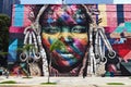 Huge colorful artwork of an indigene man in the streets of Rio de Janeiro, Brazil