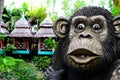 Huge concrete carved monkey statue in an Asian aquatic jungle theme park