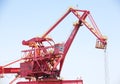 Huge construction crane against clear blue sky Royalty Free Stock Photo