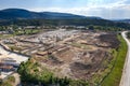 huge construction site with many working heavy machines