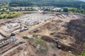 huge construction site with many working heavy machines