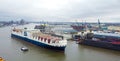 Huge container ship in the harbour of Hamburg Germany - CITY OF HAMBURG, GERMANY - DECEMBER 25, 2020 Royalty Free Stock Photo