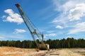 A huge crane in the mine against a clear blue sky Royalty Free Stock Photo