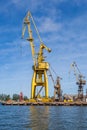 Huge cranes on the quay shipyard Royalty Free Stock Photo