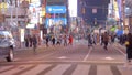 Huge crowd crossing the street at Times Square - NEW YORK CITY, USA - FEBRUARY 14, 2023
